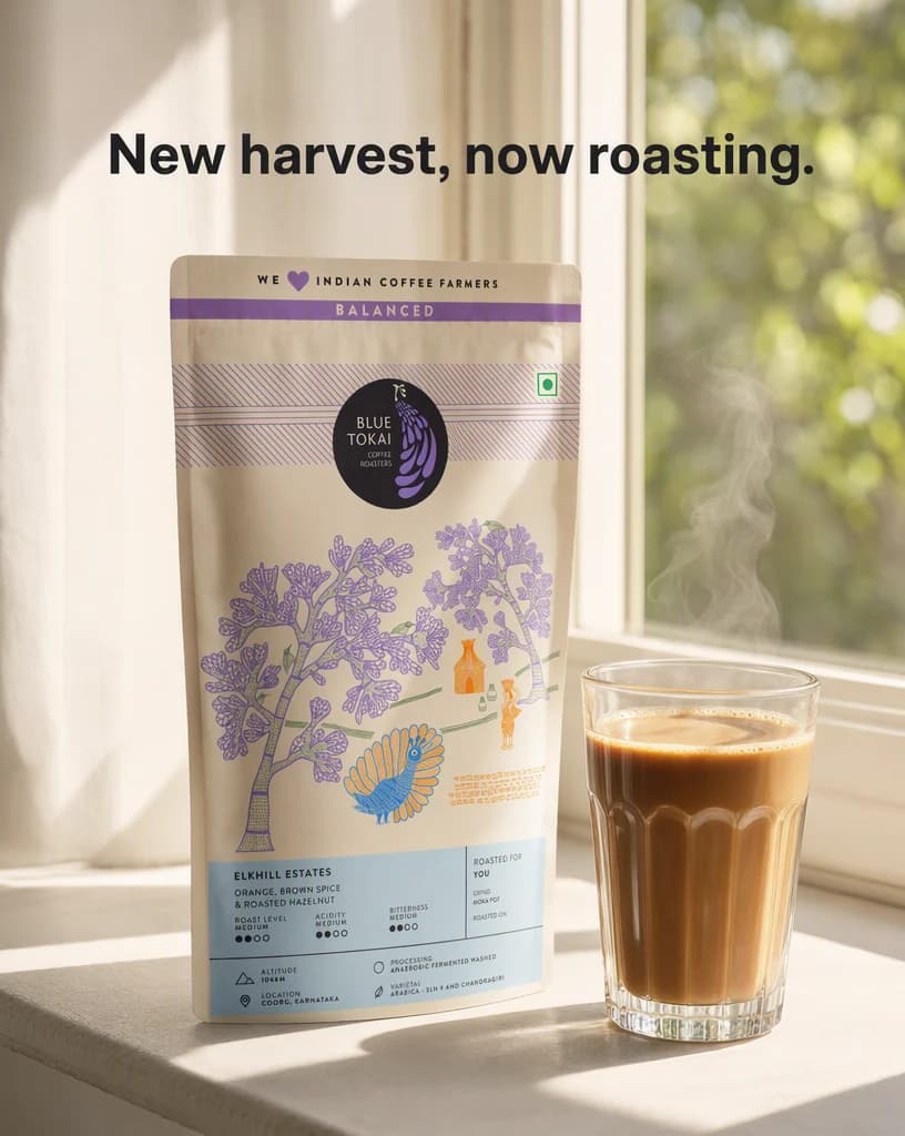 A post frame headlined “New harvest, now roasting.”, with a coffee bag standing on a sunlit windowsill beside a glass of filter coffee.