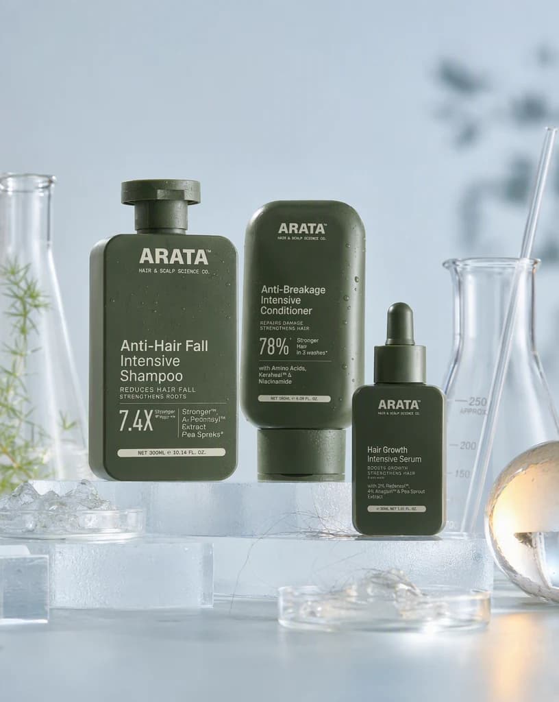 Arata haircare products in a clean bioscience laboratory campaign setting.